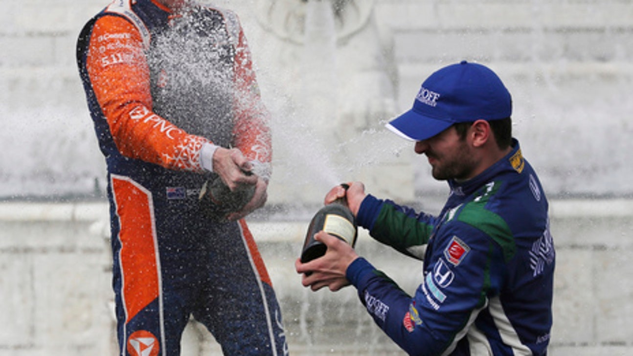The Latest: Rossi wins IndyCar pole at Belle Isle