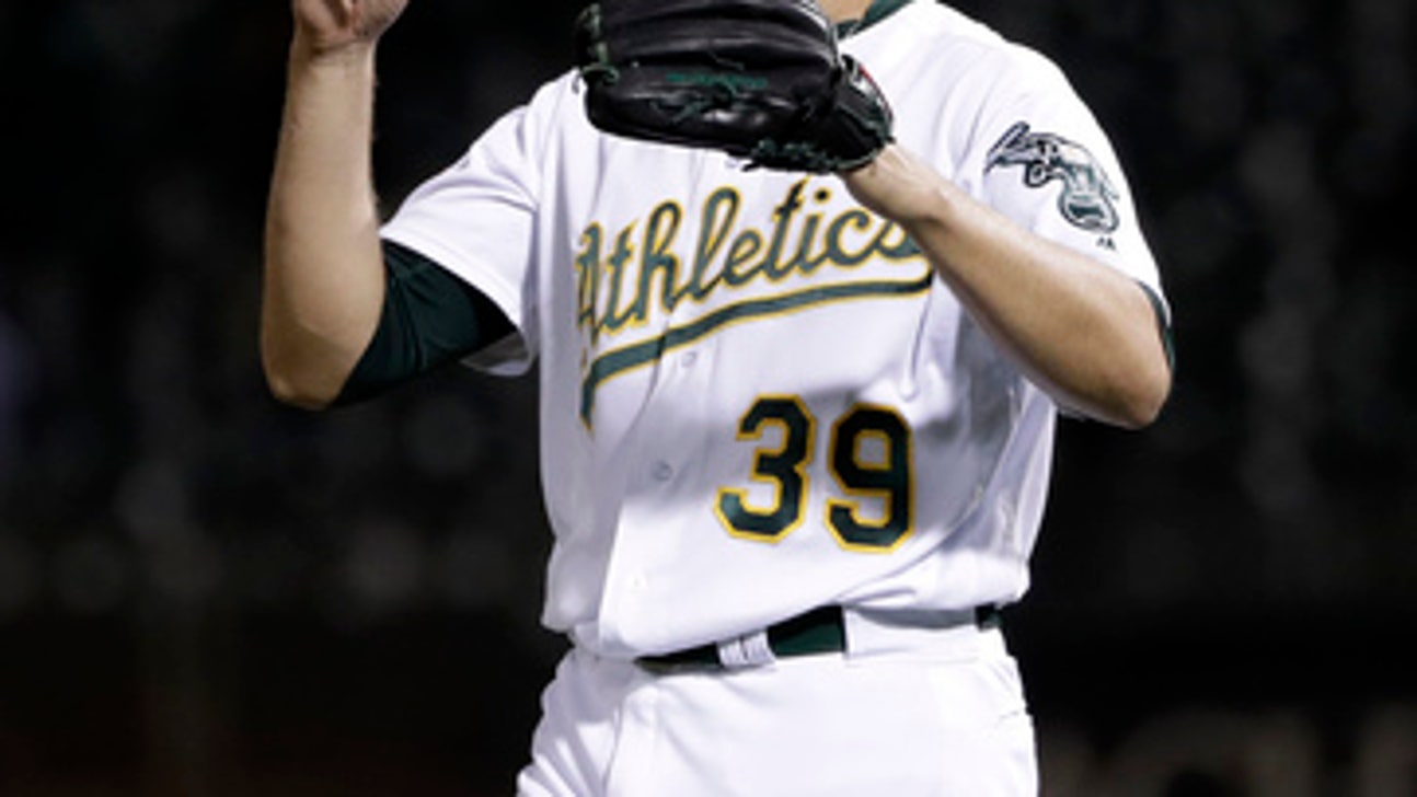 Chapman, A’s break through in 6th to beat Royals 4-1