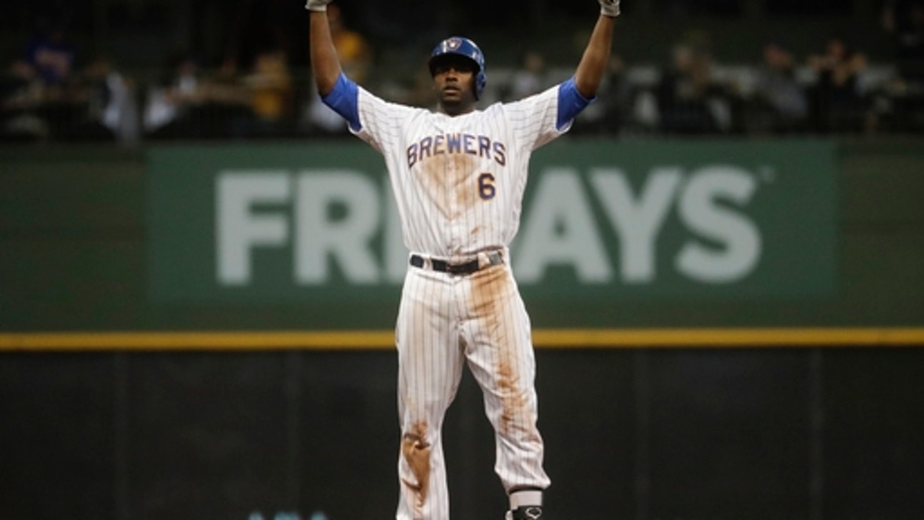 Suter leads the way, Milwaukee slugs Philadelphia 13-2