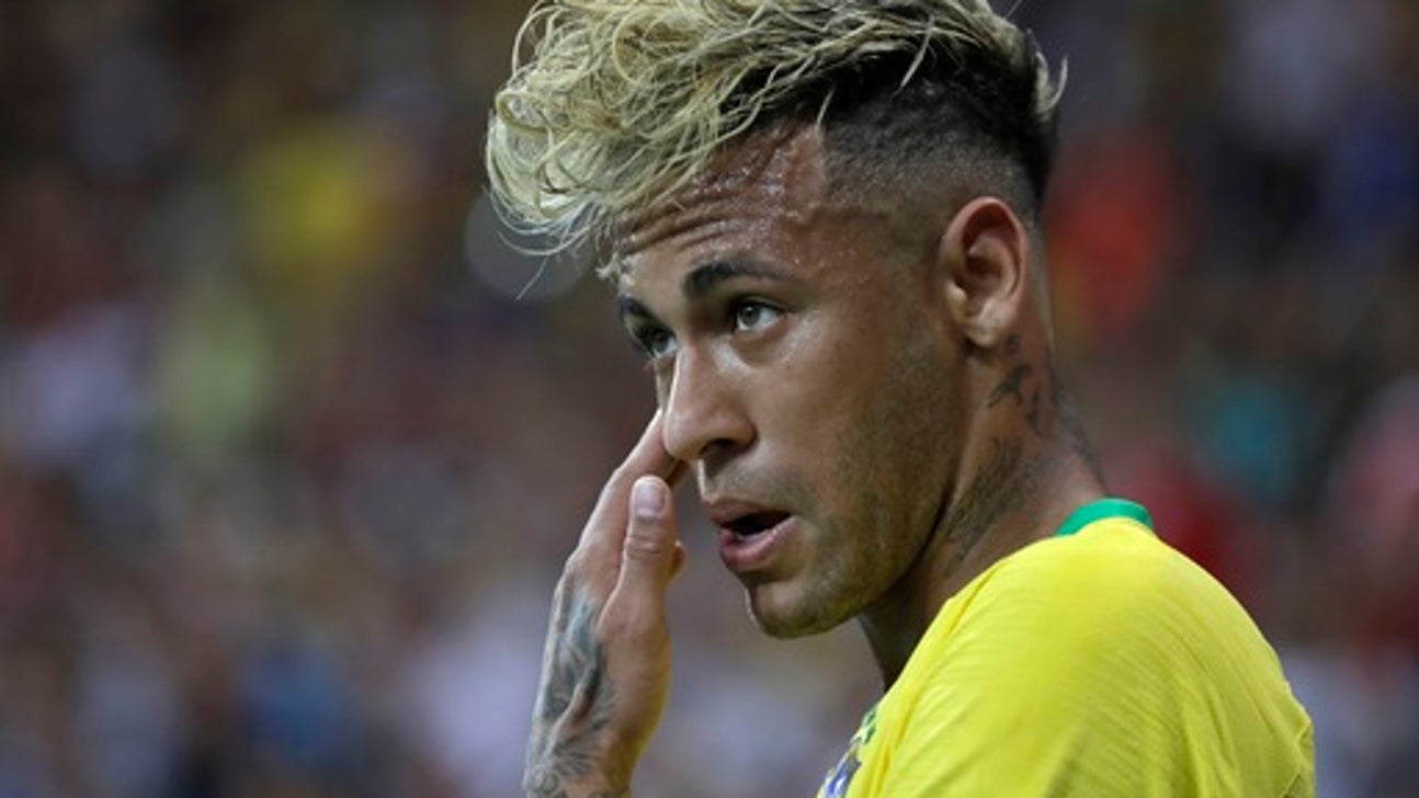 Neymar leaves Brazil training session limping