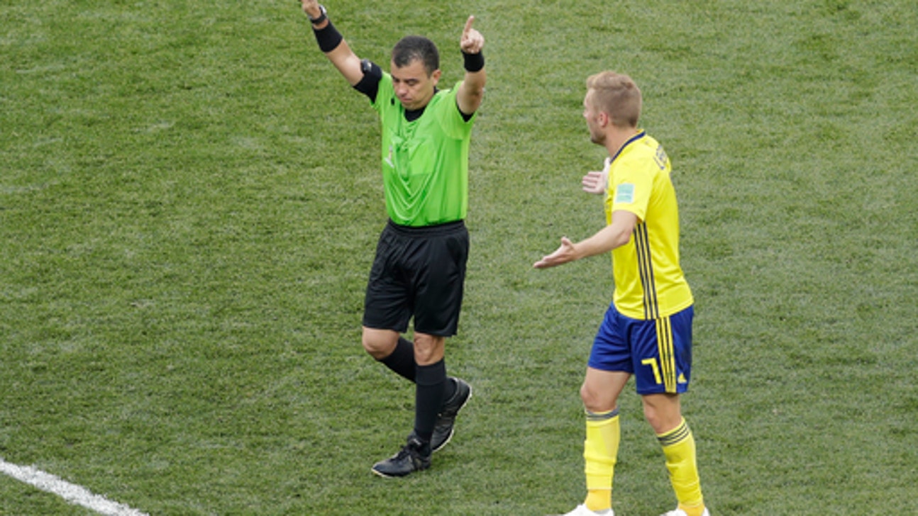 The Latest: FIFA ‘extremely satisfied’ with referee standard