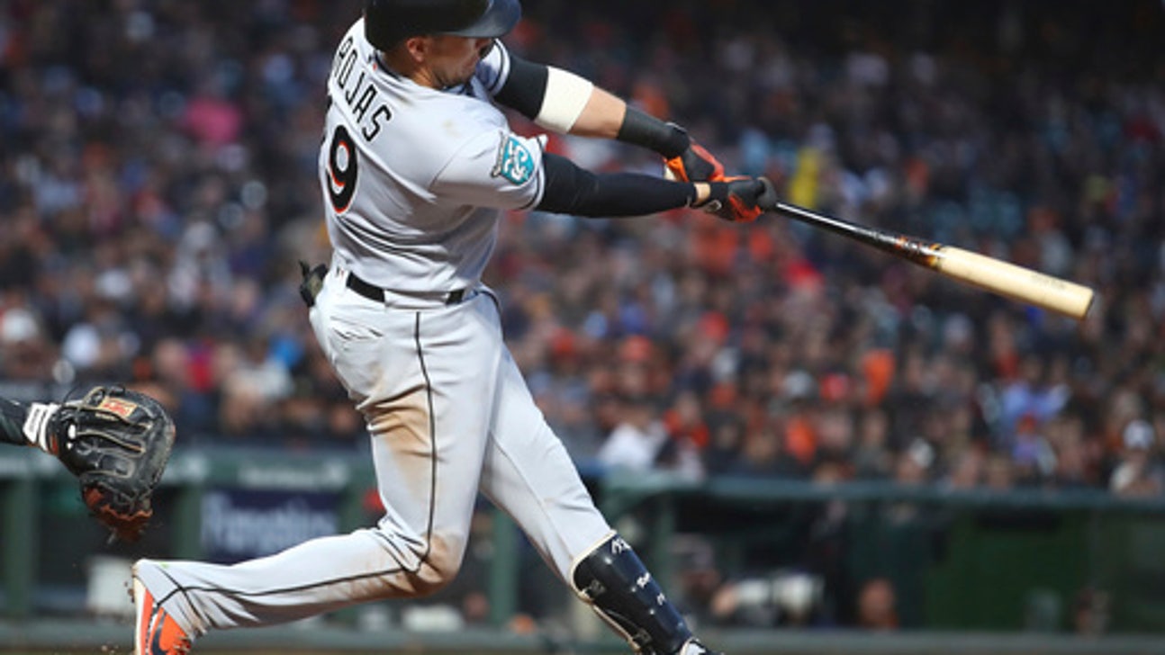 Marlins rally in ninth as Giants squander four-run lead
