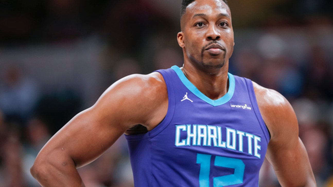 AP source: Hornets agree to trade Howard to Nets for Mozgov