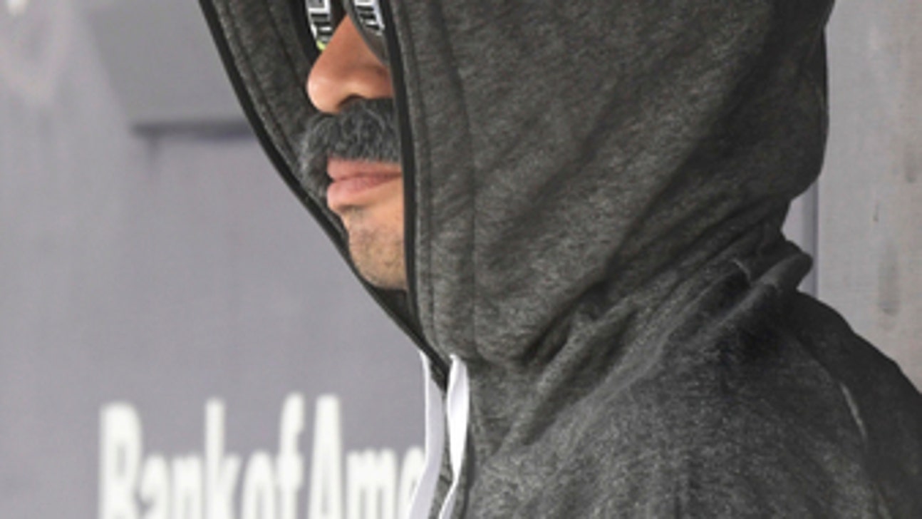 Ichi-who? Suzuki sits on M’s bench in fake mustache disguise