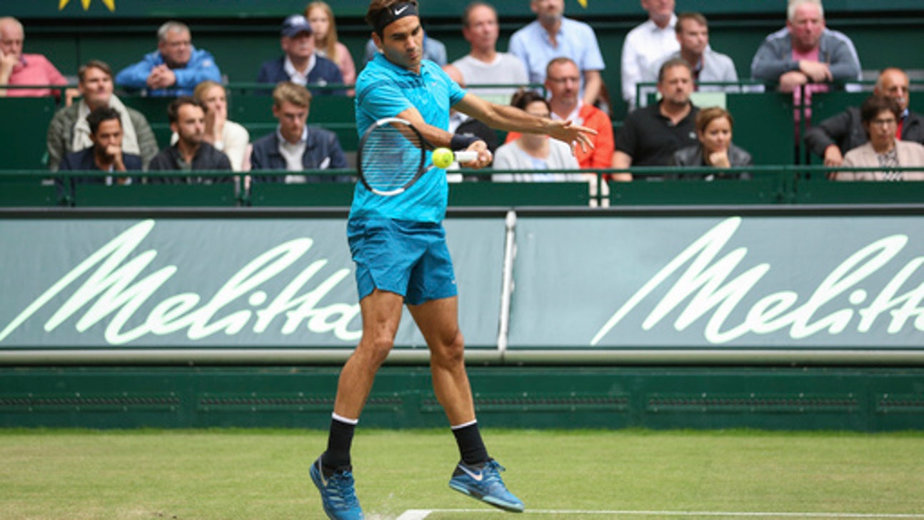 Coric ends Federer’s winning streak to take Halle title