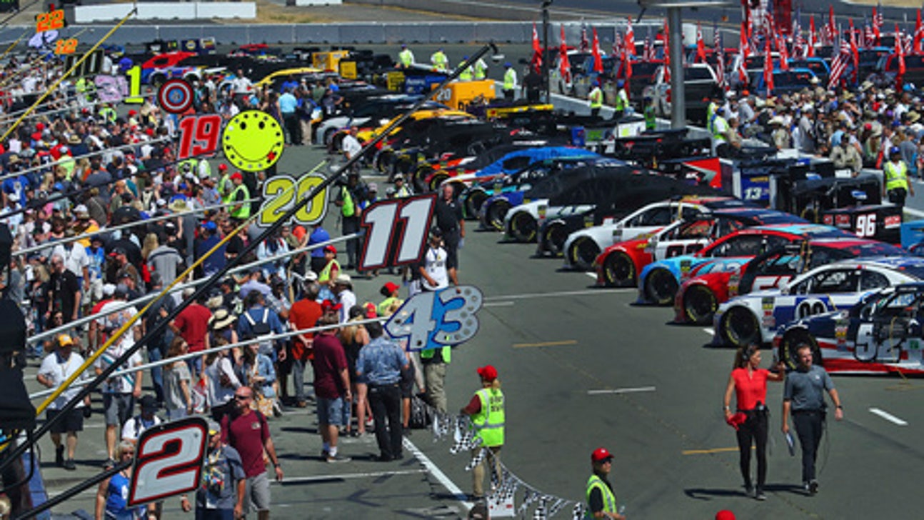The Latest: Truex takes early lead from Larson in Sonoma