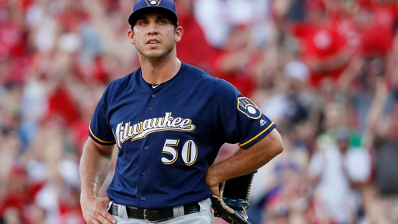 Lorenzen’s pinch-hit grand slam leads Reds over Brewers 12-3