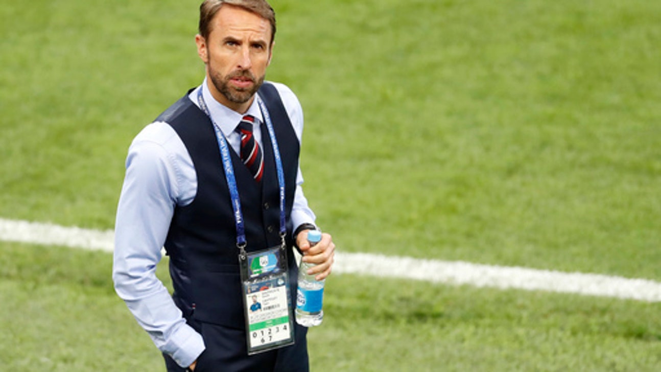Vested interest: Southgate leads England in sartorial style