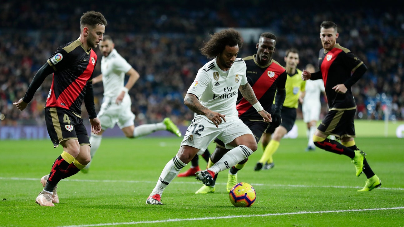 Griezmann nets 2, Atletico wins to pull level with Barcelona