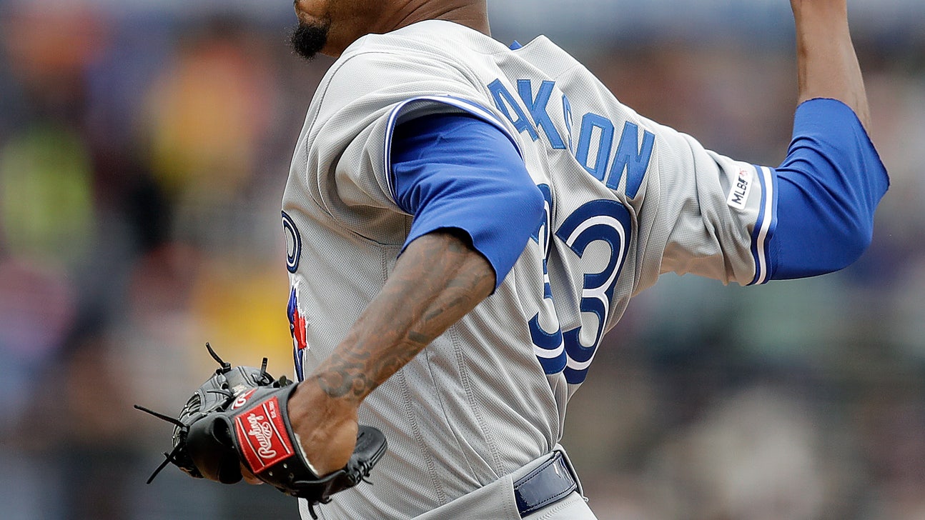 Jackson suits up for record 14th team, Jays lose to Giants