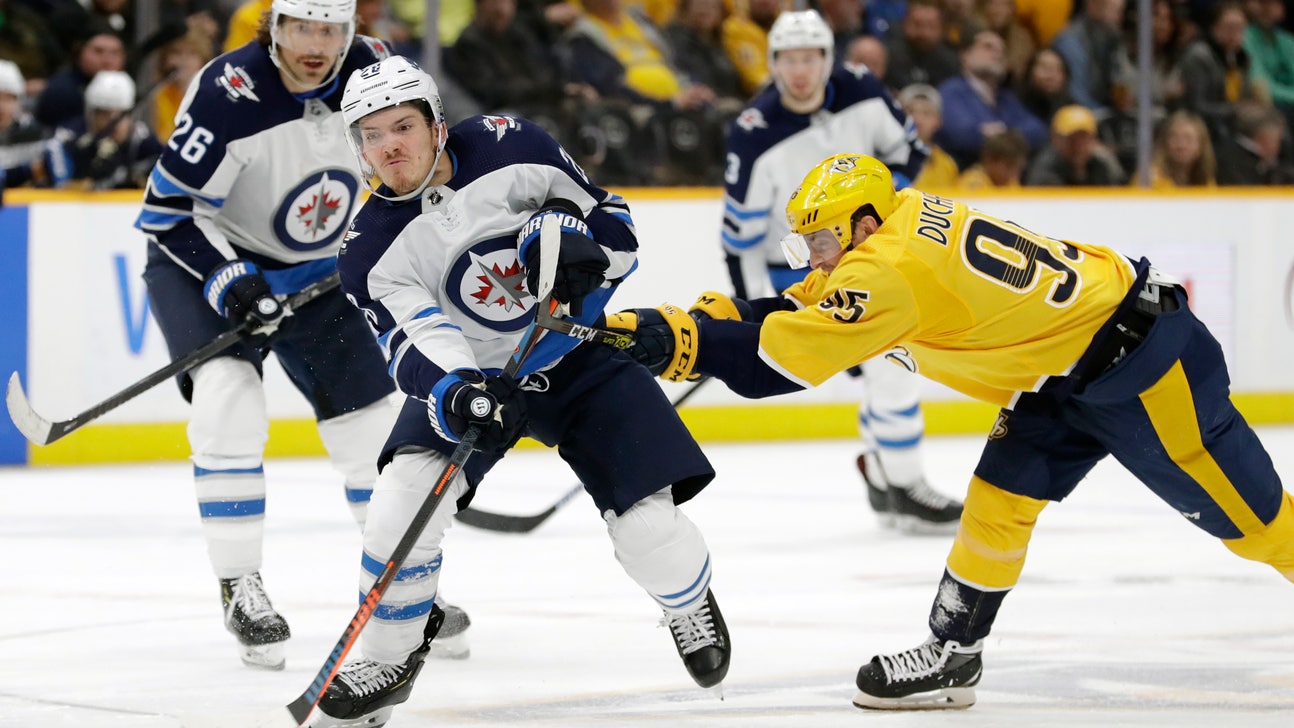 Hellebuyck's 38 saves lead Jets past Predators 2-1