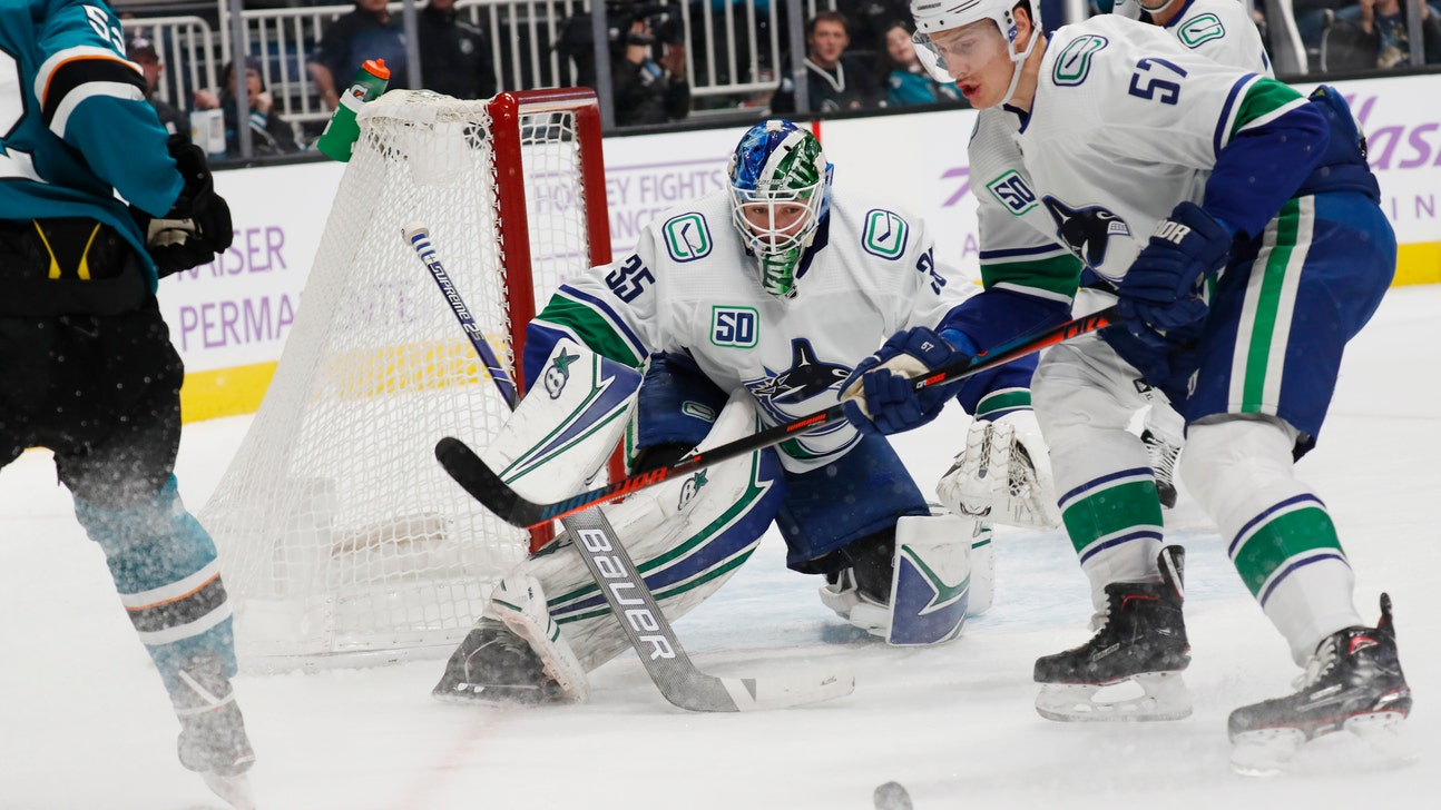 Pettersson scores twice, Canucks beat Sharks 5-2