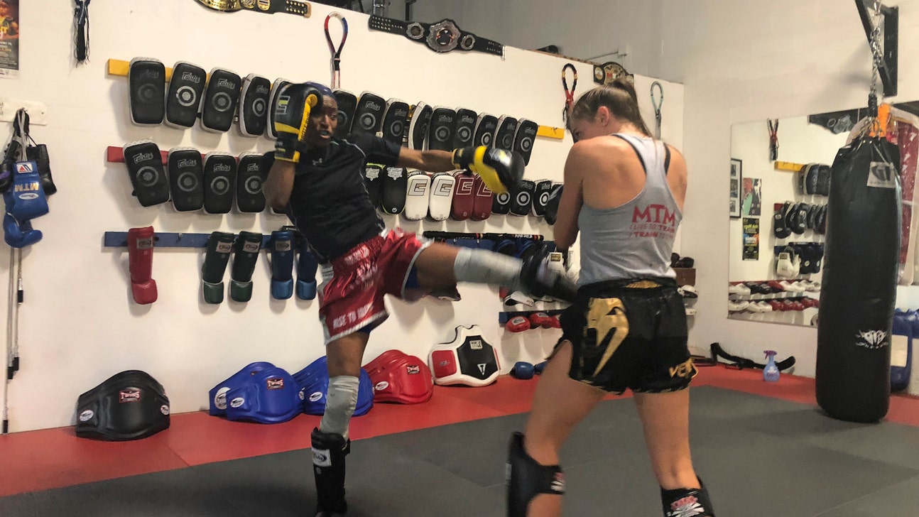 New Cal coach Charmin Smith learns from Muay Thai boxing