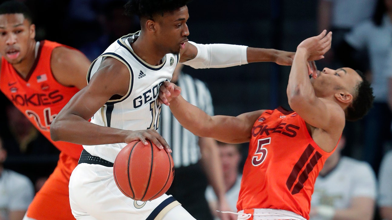 No. 9 Virginia holds off Georgia Tech 52-49