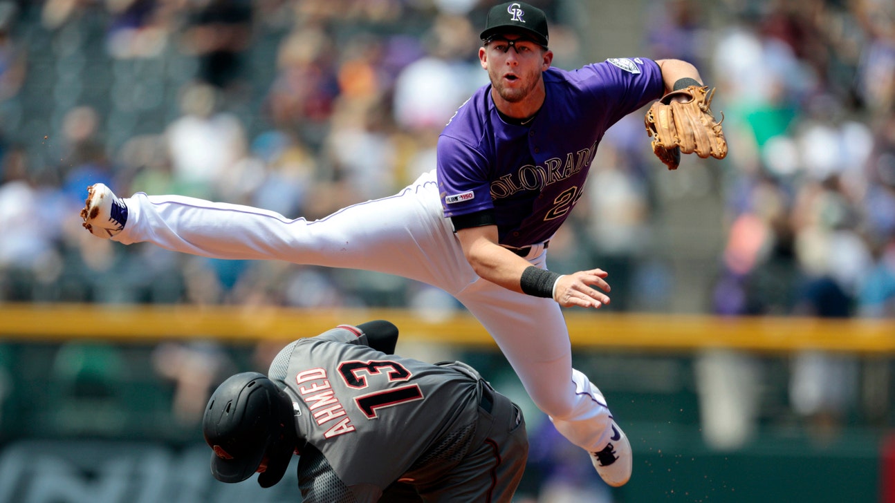 Murphy hits RBI single in 10th, Rockies beat Arizona 11-10