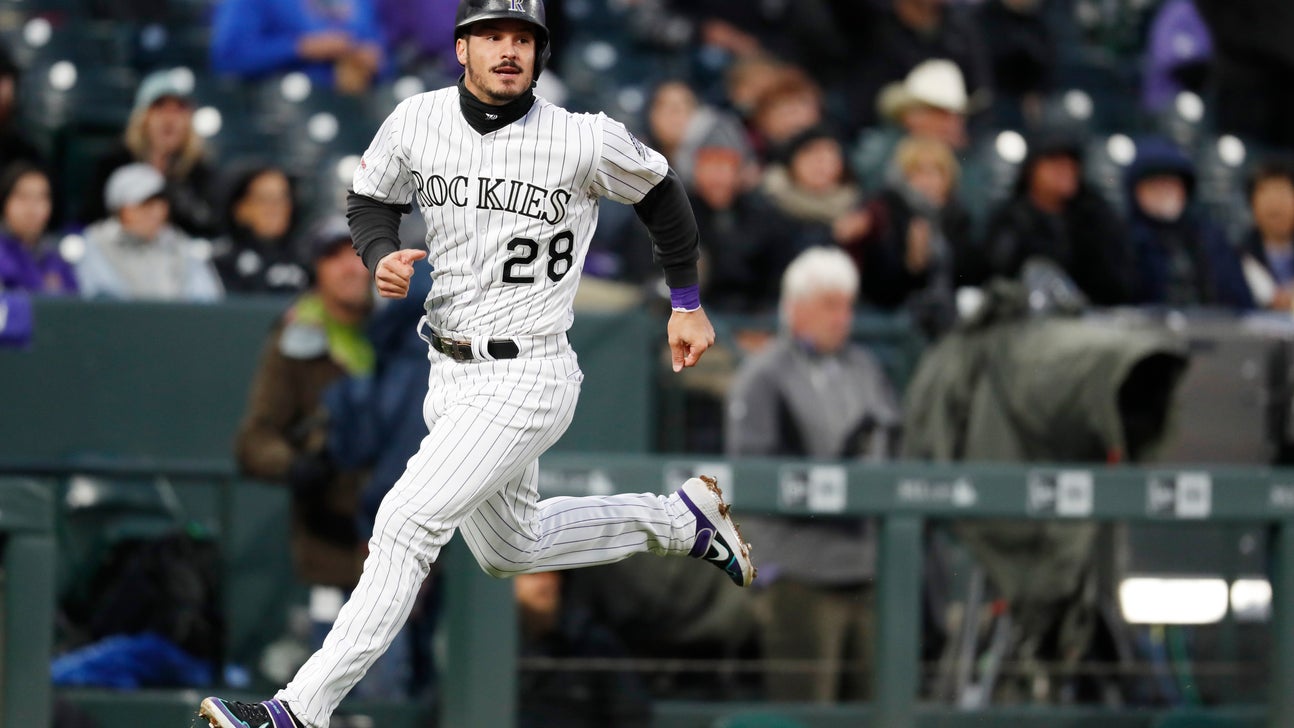 Iannetta homers in 7th, Rox beat D’backs 6-2 on rainy night