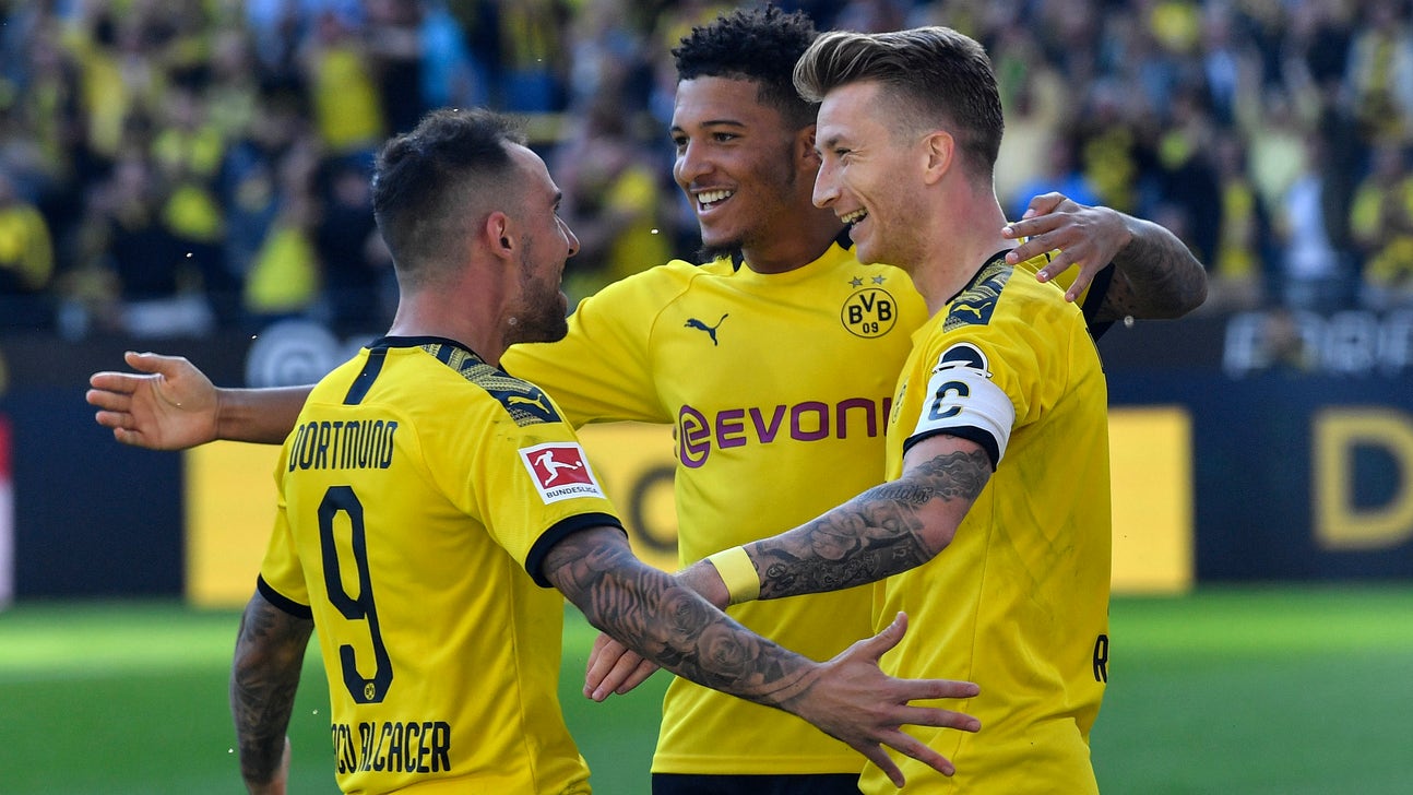 Dortmund routs Leverkusen 4-0, Leipzig holds Bayern 1-1