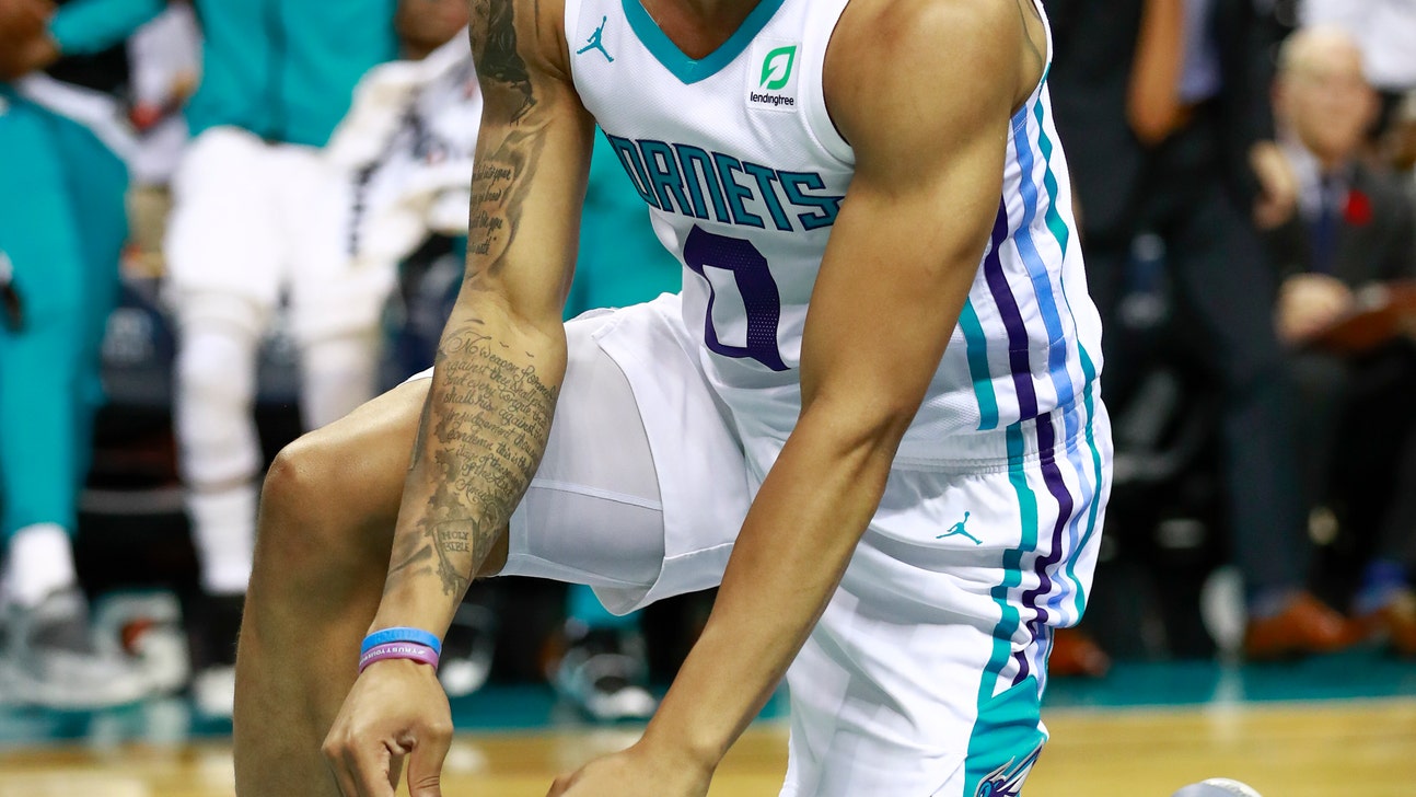 Walker scores 29, leads Hornets to 113-102 win over Hawks