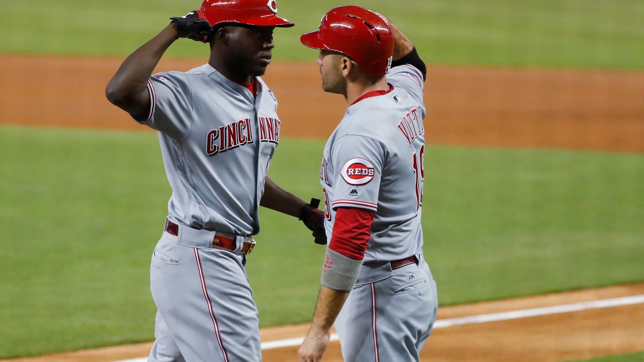 Aquino breaks NL rookie record but Marlins beat Reds 4-3