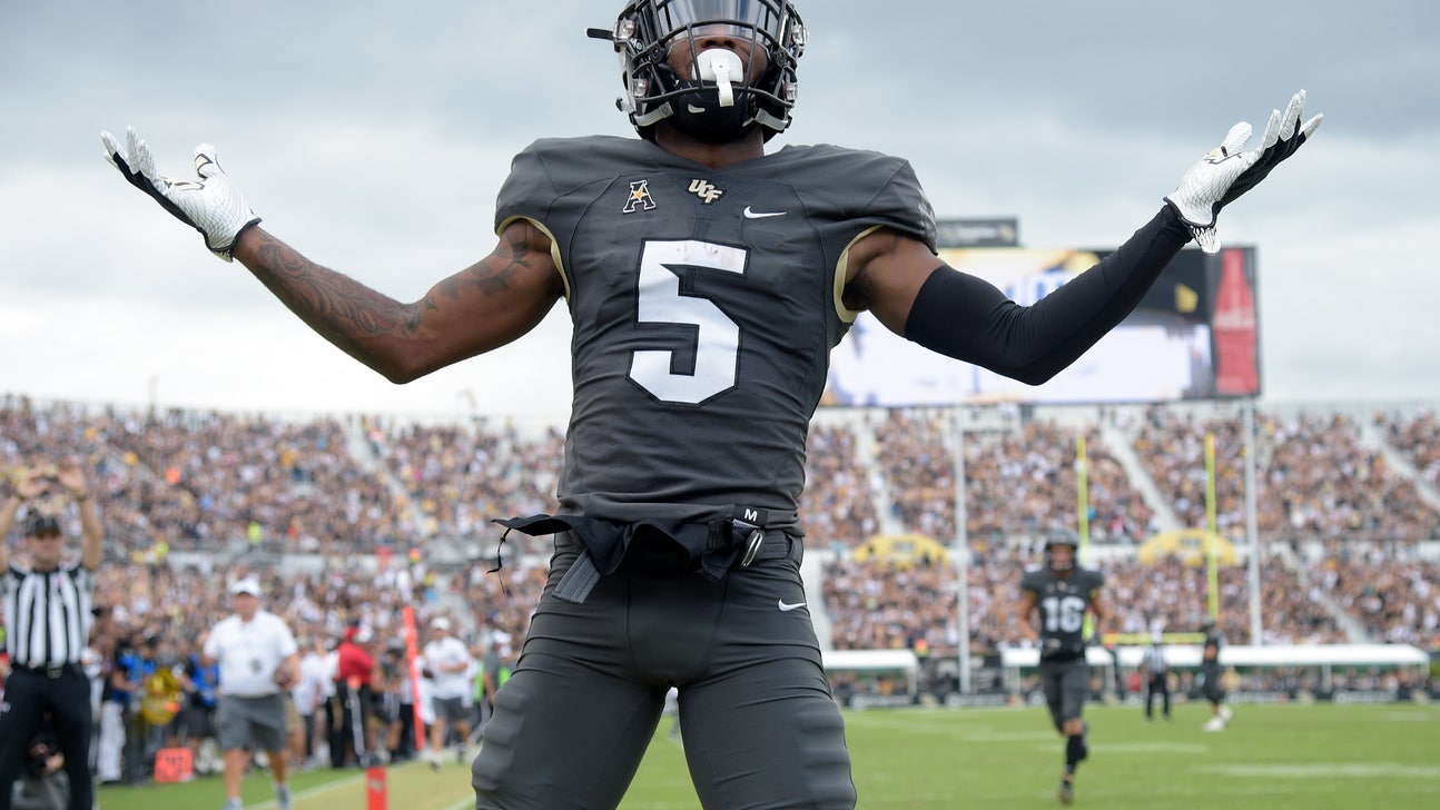Milton accounts for 3 TDs, No. 11 UCF beats Navy 35-24