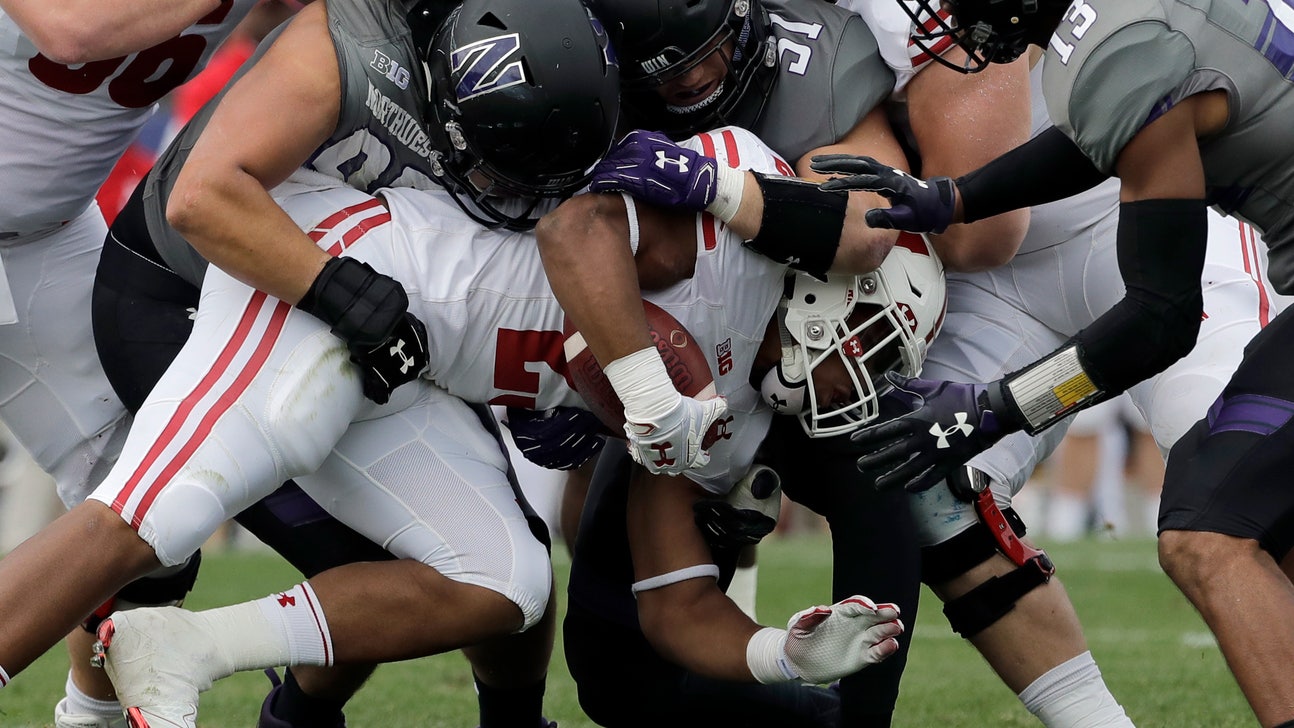 National rushing race tight after Badgers' Taylor struggles