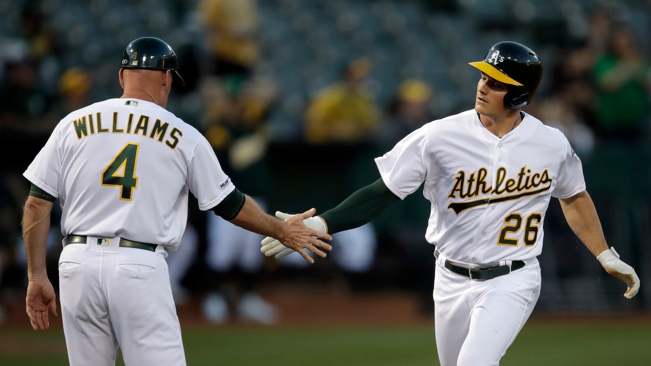 Chapman, Piscotty lead A’s offense in 11-5 win over Rangers