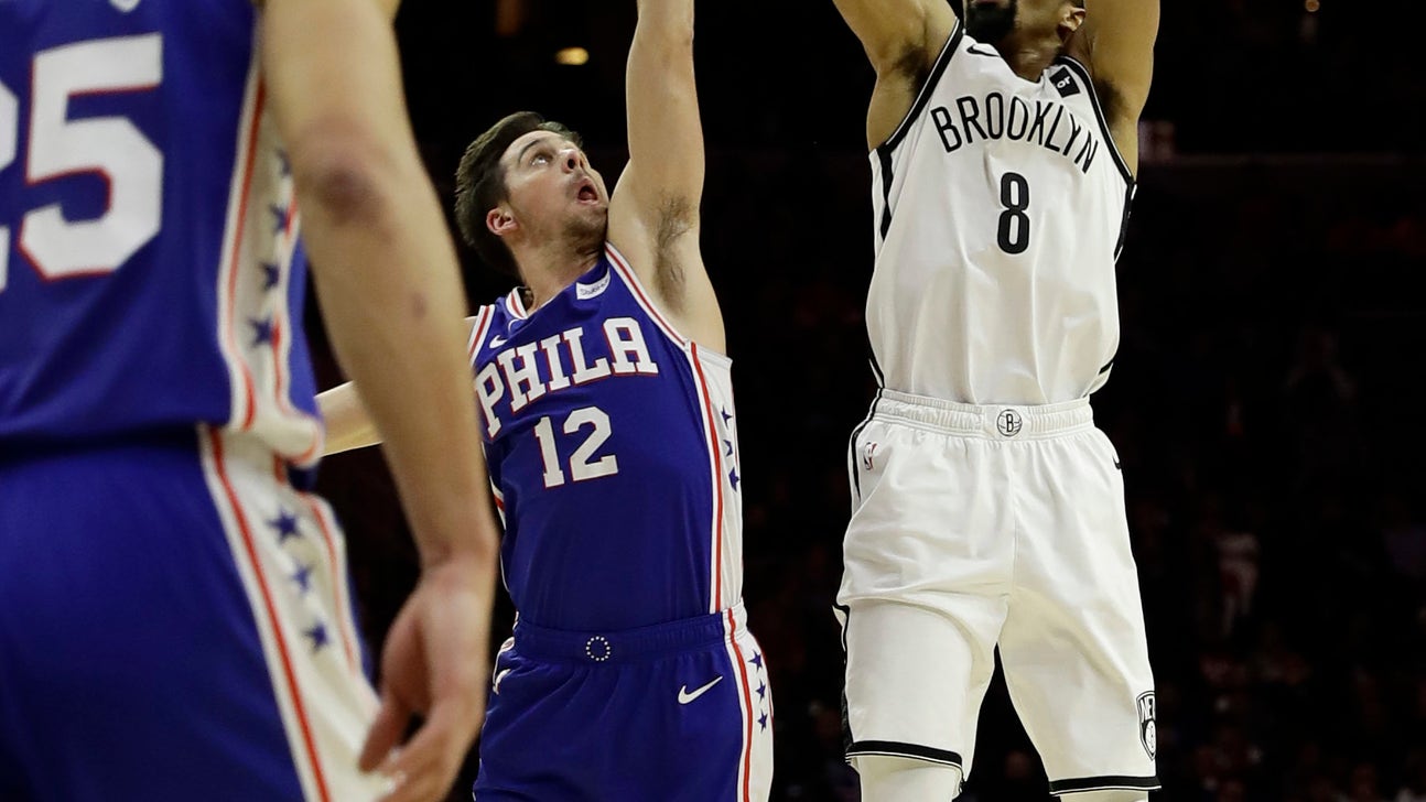 Dinwiddie caps climb from G League with extension from Nets