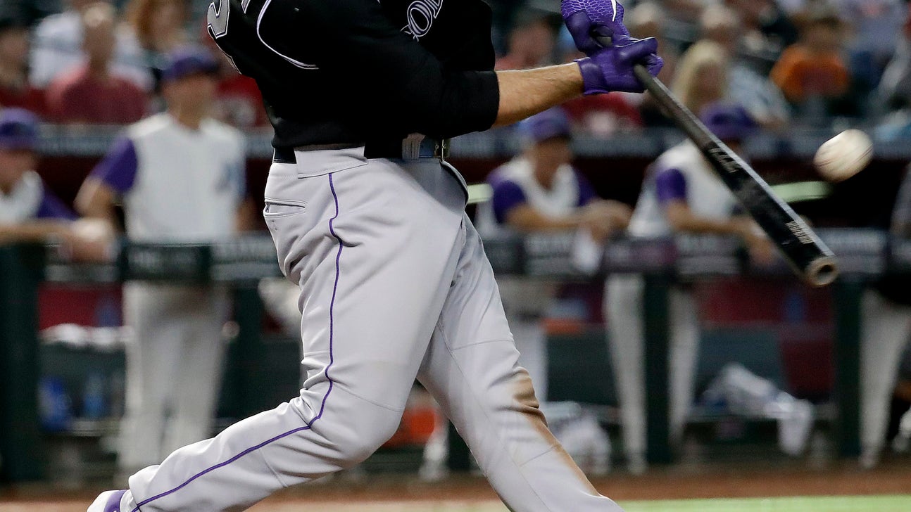 Iannetta drives in 2 in 10th, Rockies sweep D-backs