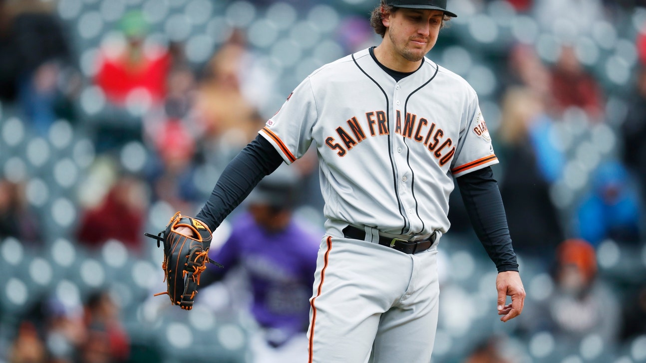 Holland rips Giants' front office, says he faked injury