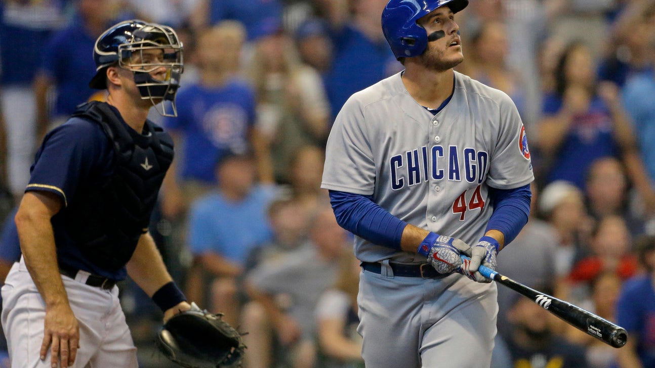 Brewers beat Cubs 4-3 in 9th after Yelich beats throw