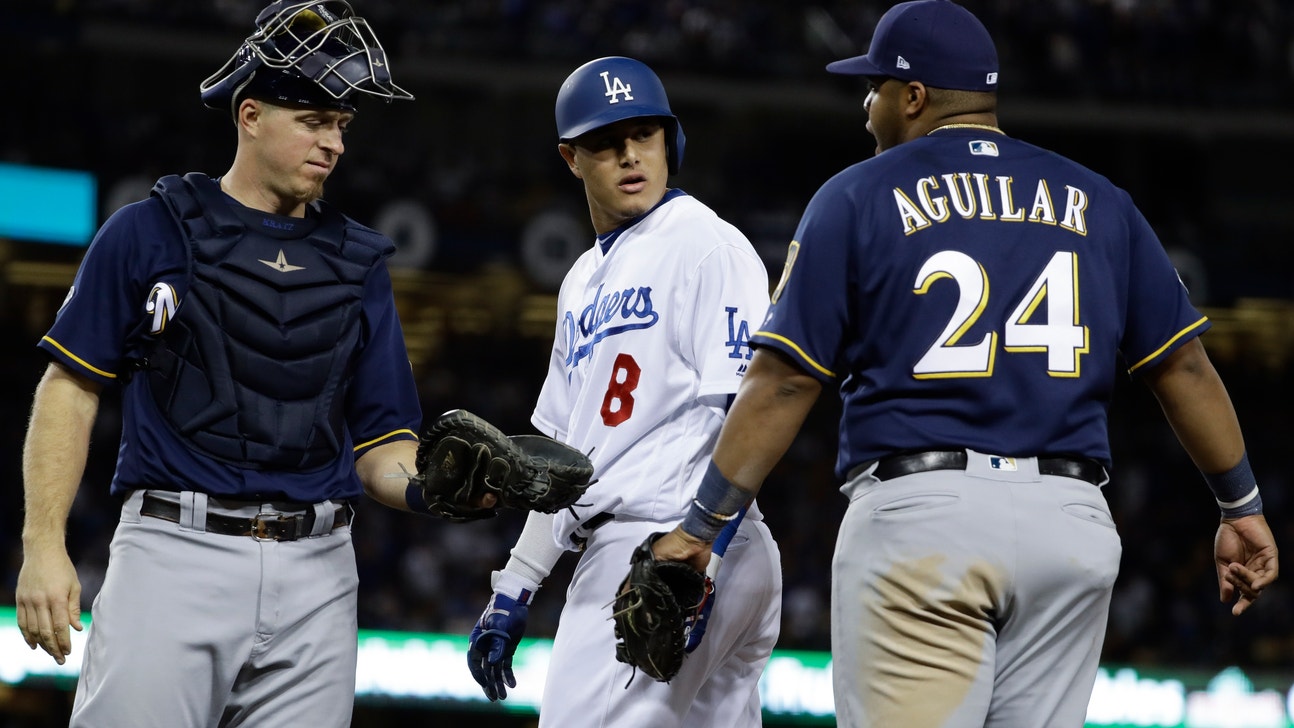 Benches clear after Machado clips Aguilar’s leg in NLCS