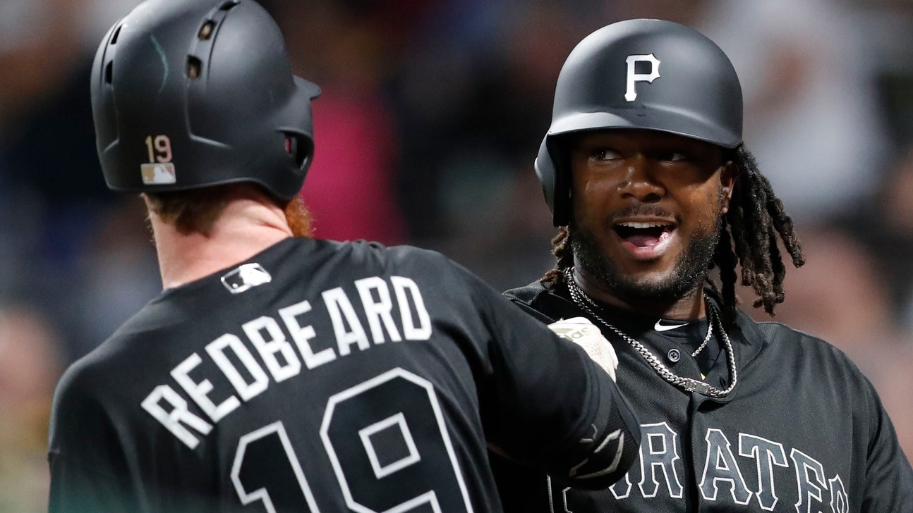 Bell tops 100 RBIs, Pirates cruise past Reds 14-0