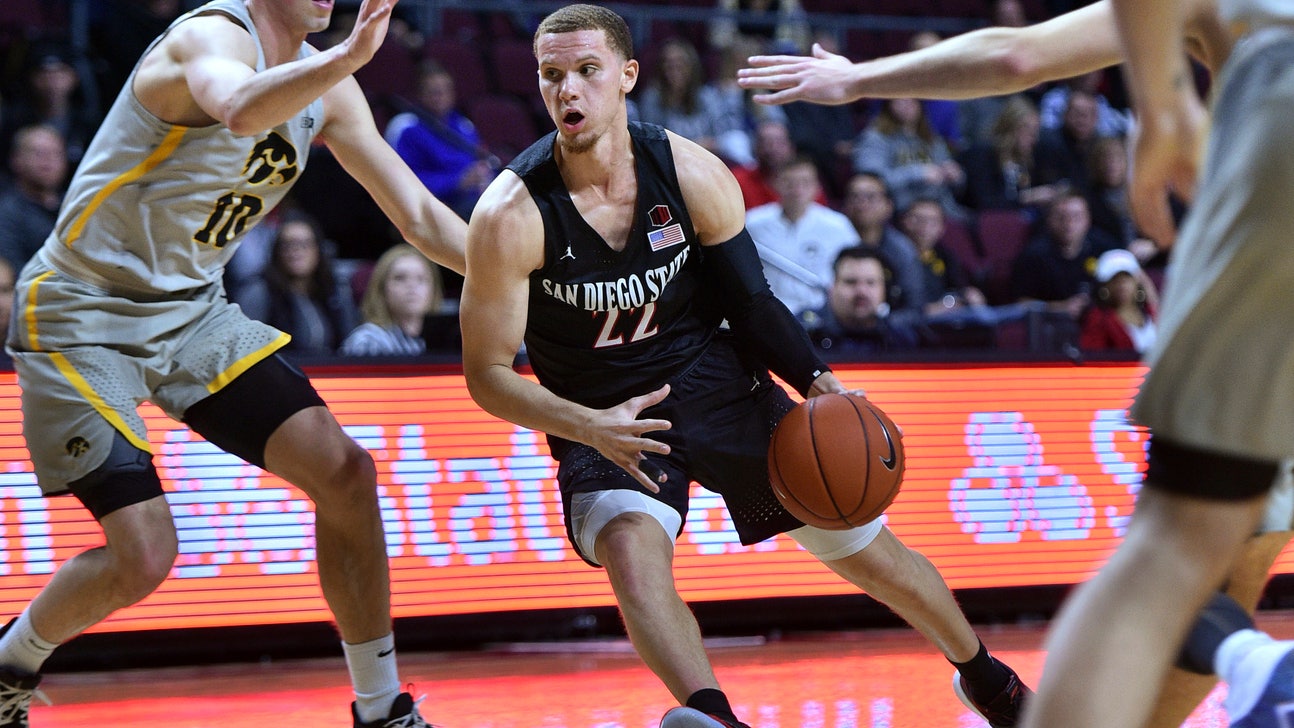 Flynn scores 28 2nd-half points as San Diego St. tops Iowa