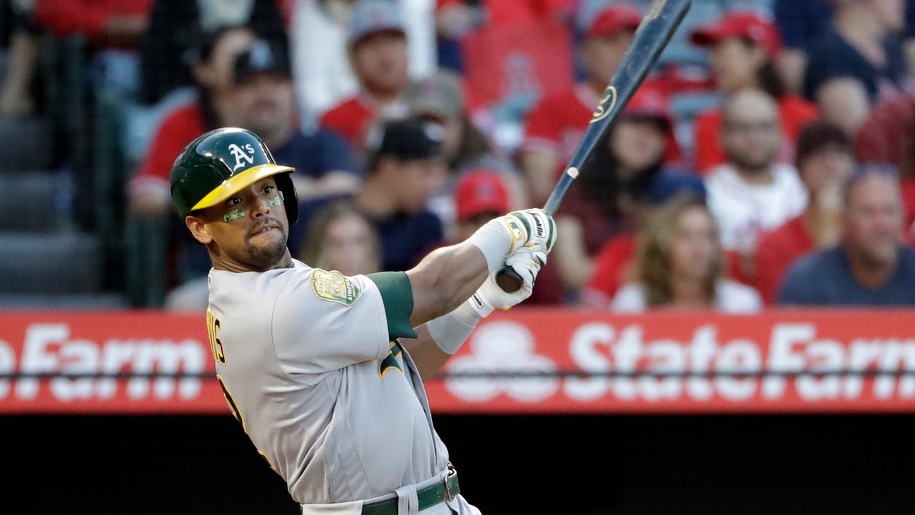 Slugger Khris Davis, A’s reach agreement on one-year deal