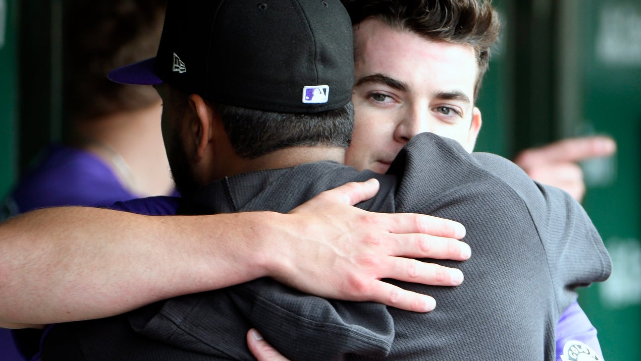 Lambert sparkles to win debut, Rockies top Cubs 3-1