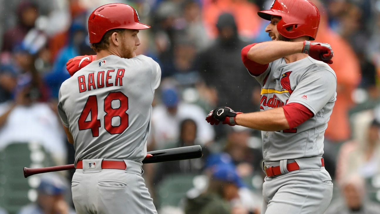 Goldschmidt, Cards clinch playoff spot, rally past Cubs 3-2