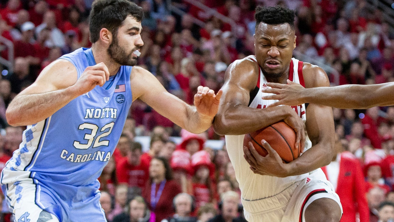No. 12 UNC beats No. 15 NC State 90-82 in rivalry game