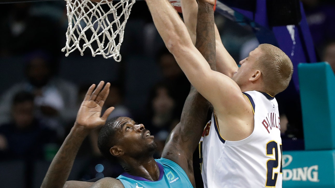 Walker scores 21, Hornets snap Nuggets’ 7-game win streak