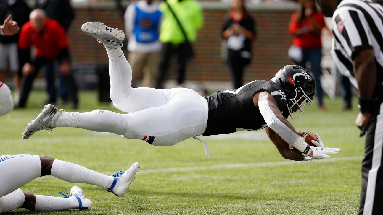 No. 21 Cincinnati holds on for 24-13 win over Tulsa