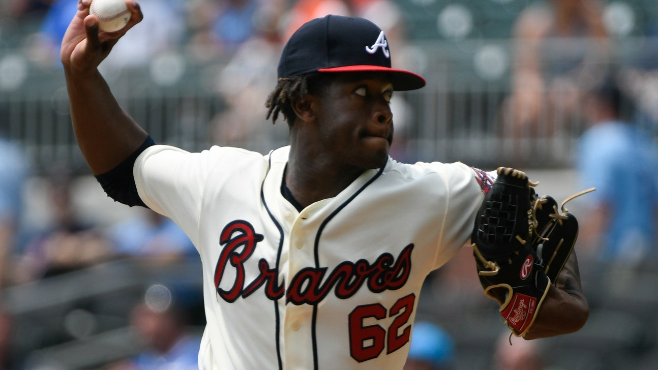 Toussaint wins big league debut, Braves rout Marlins 9-1