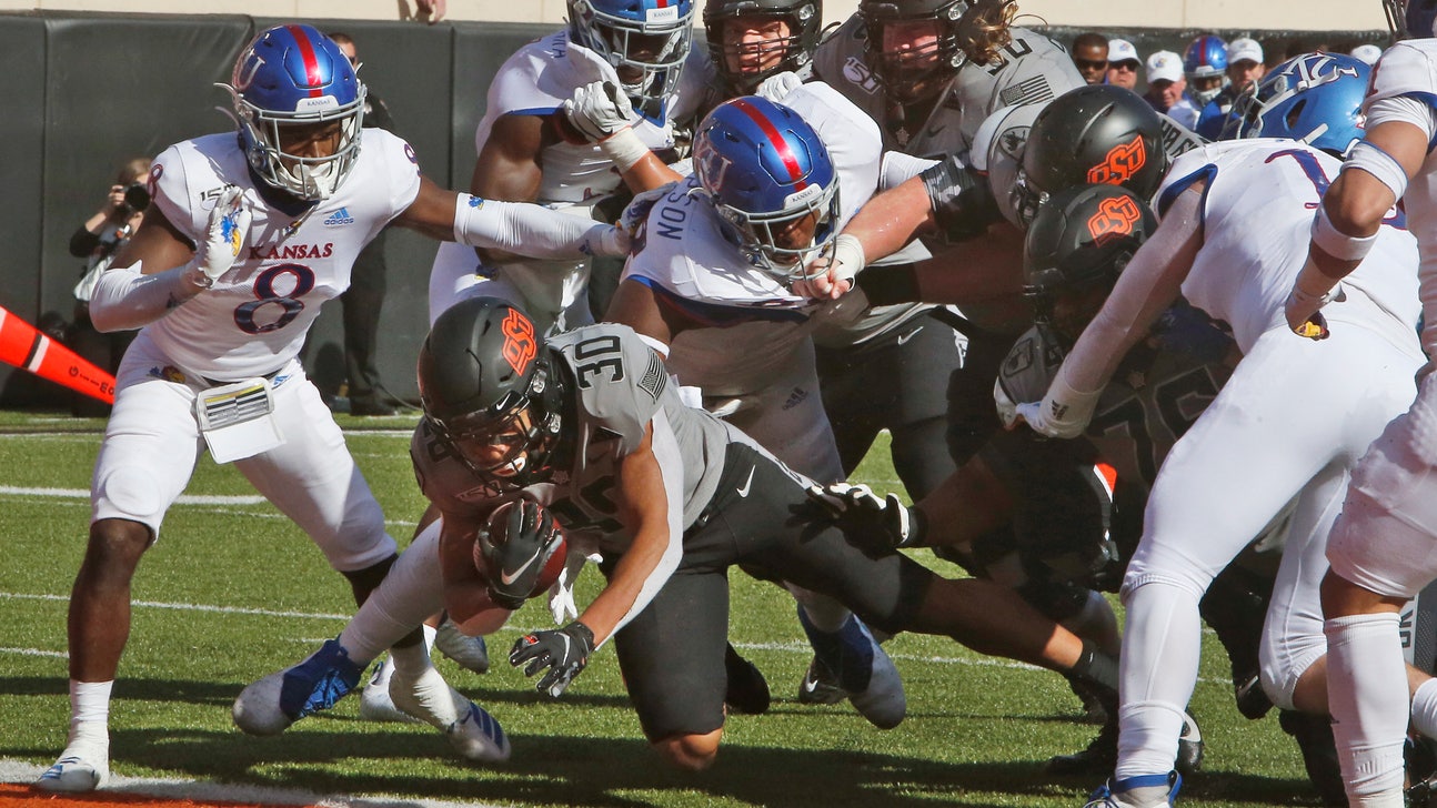 Hubbard leads No. 25 Oklahoma St. past Kansas 31-13