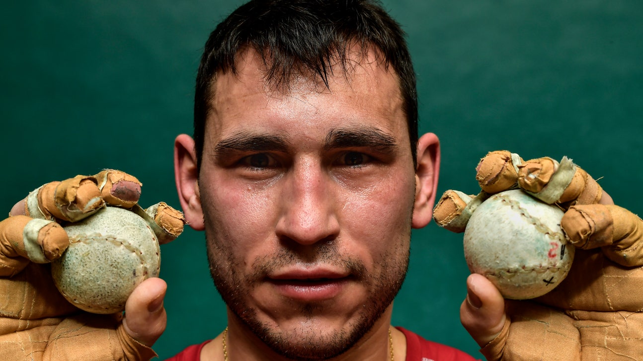 AP PHOTOS: Spanish Basque Ball players use hands to hit ball