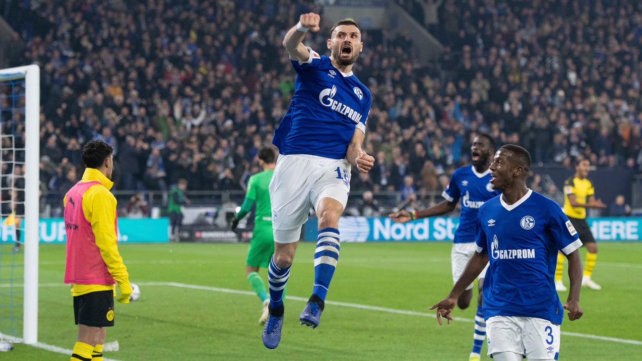 Dortmund beats Schalke 2-1 in Ruhr derby, Bayern keeps pace