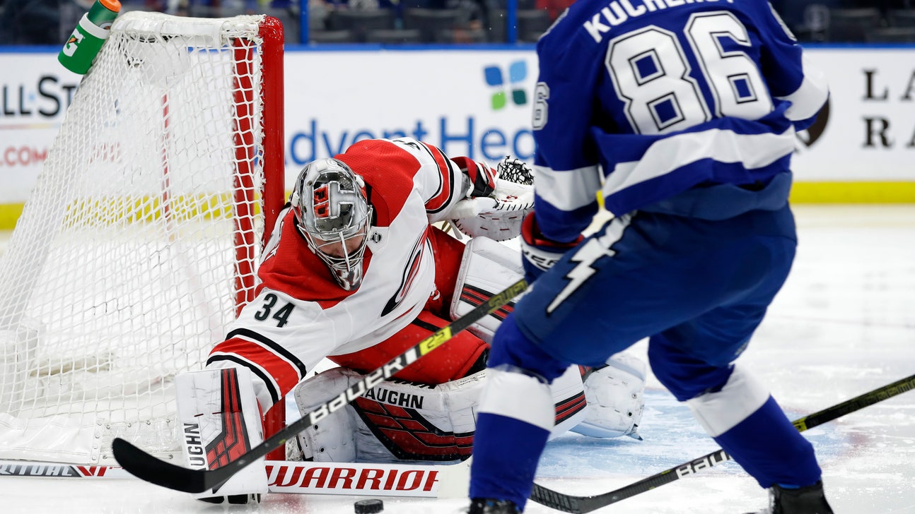 Point has 2 late goals, Lightning beat Hurricanes 3-1