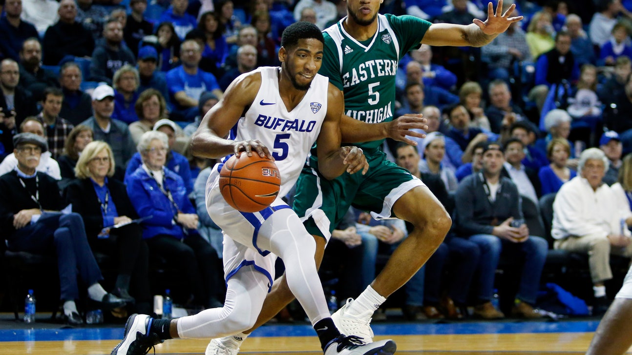 Massinburg scores 31, No. 16 Buffalo tops Eastern Michigan