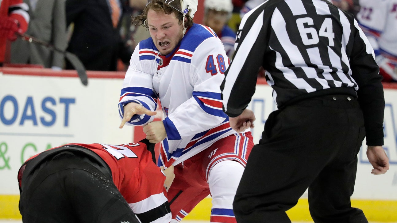 Carrick scores late as Devils beat Rangers, avoid sweep