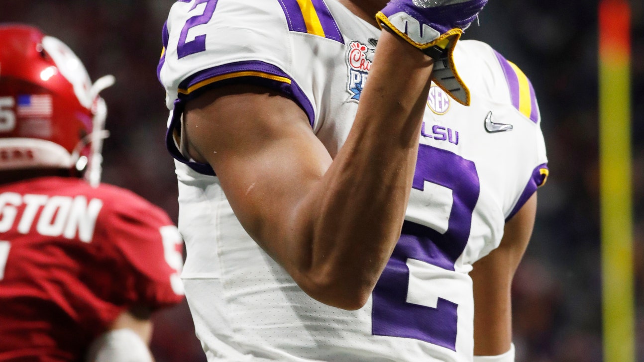 No. 1 LSU's Burrow's 7 TD passes ties record for bowl game