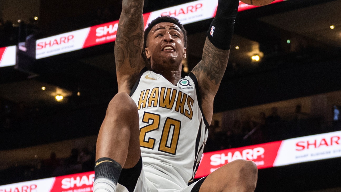 Collins leads Hawks past Nuggets 106-98