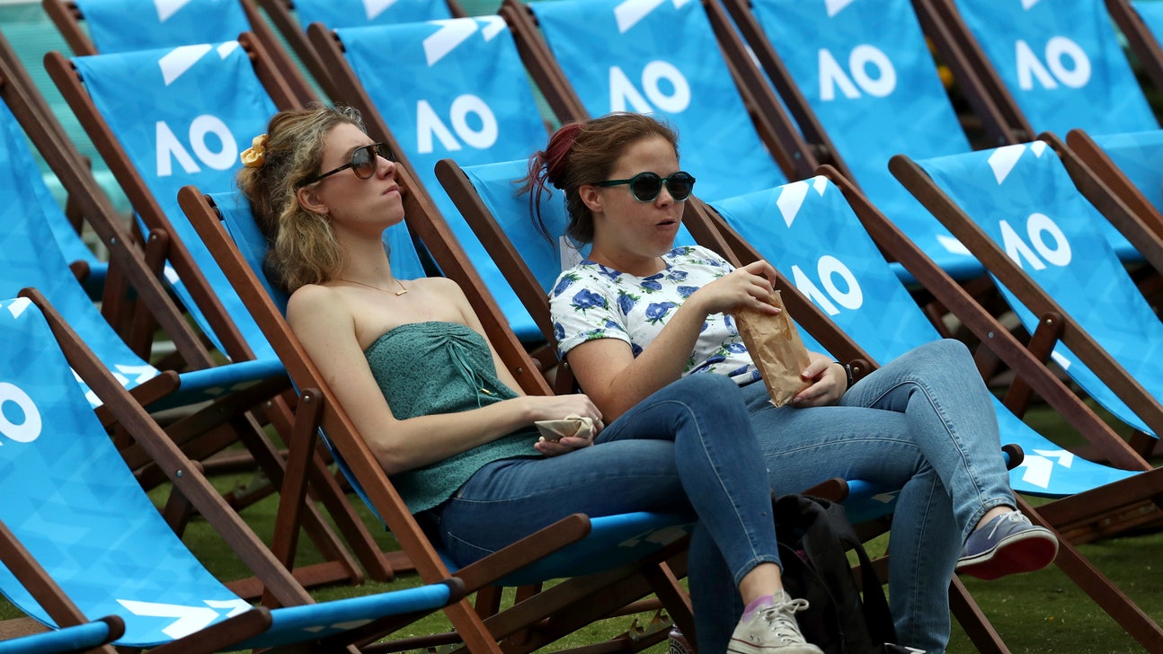 The Latest: Djokovic's win wraps up opening day in Melbourne