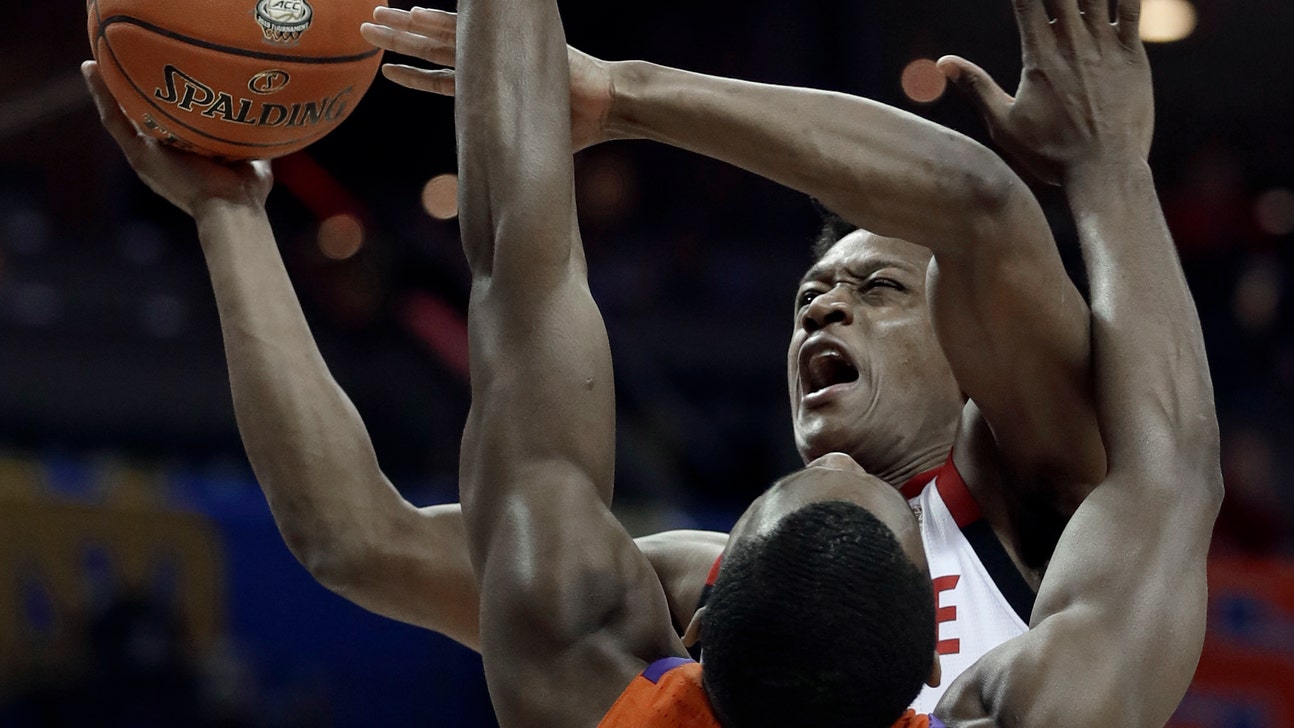 Johnson helps NC State edge Clemson 59-58 in ACCs